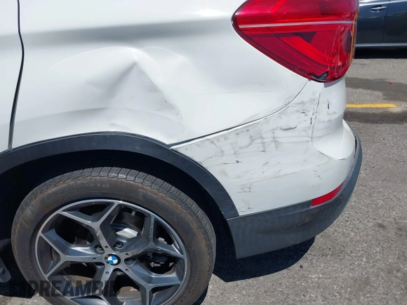 2017 BMW X1 xDrive28i with VIN WBXHT3C33H5F86831, listed as a IAAI auction lot 42019082 with 74,708 mi miles and . Bid and sale history available at DreamBid. Image 6.