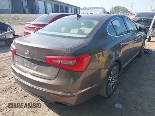2014 Kia Cadenza Premium with VIN KNALN4D75E5146138, listed as a IAAI auction lot 39708948 with 106,767 mi miles. Bid and sale history available at carsss.com. Image 4.