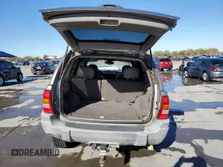 1999 Jeep Grand Cherokee Laredo with VIN 1J4GW58NXXC776438, listed as a Copart auction lot 84412044 with 163,060 mi miles and Salvage title. Bid and sale history available at DreamBid. Image 6.
