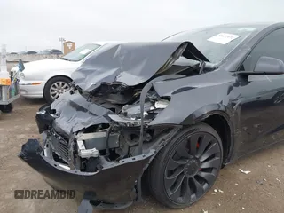 2024 Tesla Model Y Performance with VIN 7SAYGDEF7RF053265, listed as a IAAI auction lot 42132172 with 17,102 mi miles and . Bid and sale history available at DreamBid. Image 6.