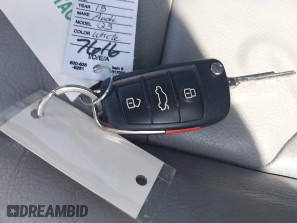 2018 Audi Q3 Premium with VIN WA1ECCFS3JR016577, listed as a IAAI auction lot 42177891 with 91,876 mi miles and . Bid and sale history available at DreamBid. Image 11.