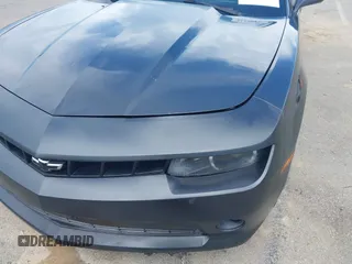 2014 Chevrolet Camaro LT z VIN 2G1FC1E31E9254364, wystawiony jako IAAI lot #42230839 z przebiegiem 102 036 mil mil oraz . Historia ofert i sprzedaży dostępna na DreamBid. Obrazek 17.