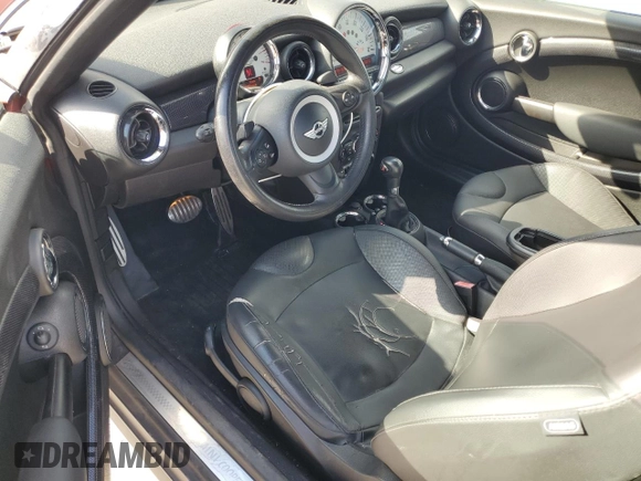 2013 MINI Coupe S z VIN WMWSX3C59DT466802, wystawiony jako Copart lot #56860965 z przebiegiem 88 053 mil mil oraz Szkoda całkowita • Salvage title. Historia ofert i sprzedaży dostępna na DreamBid. Obrazek 8.