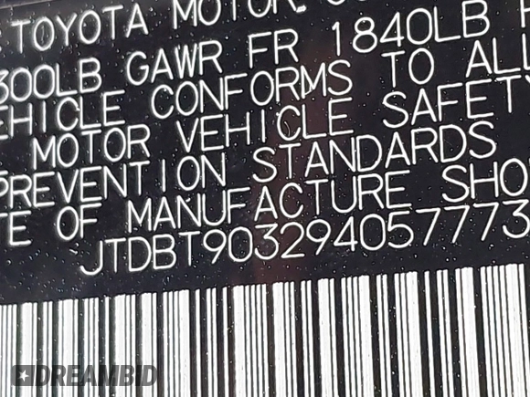 2009 Toyota Yaris with VIN JTDBT903294057773, listed as a IAAI auction lot 42071027 with 164,128 mi miles. Bid and sale history available at carsss.com. Image 9.
