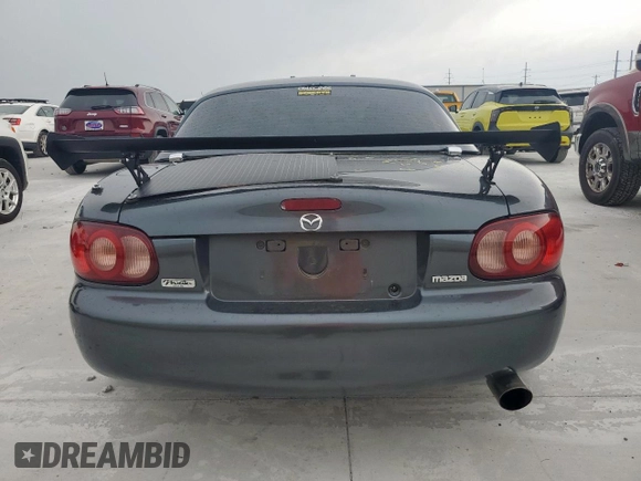 2001 Mazda MX-5 Miata with VIN JM1NB353210210976, listed as a Copart auction lot 59653695 with 152,250 mi miles and Salvage title. Bid and sale history available at DreamBid. Image 6.
