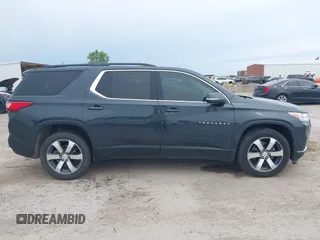 2021 Chevrolet Traverse LT with VIN 1GNERHKW4MJ191814, listed as a IAAI auction lot 42185544 with 87,493 mi miles and . Bid and sale history available at DreamBid. Image 13.