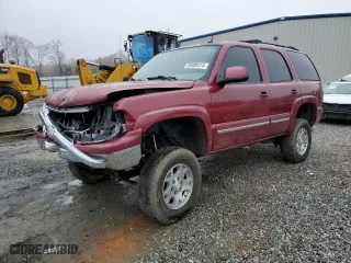2004 Chevrolet Tahoe LS with VIN 1GNEC13ZX4J240970, listed as a Copart auction lot 85000414 with 0 mi miles and Salvage Title. Bid and sale history available at carsss.com. Image 1.