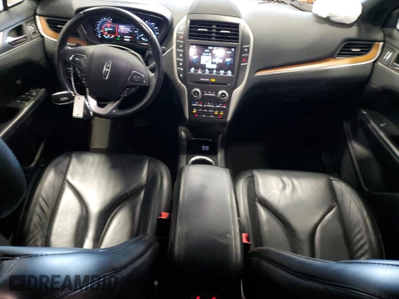 2019 Lincoln MKC Select with VIN 5LMCJ2D90KUL25654, listed as a Copart auction lot 56461185 with 56,296 mi miles and Salvage title. Bid and sale history available at DreamBid. Image 8.