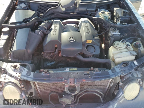 2001 Mercedes-Benz E-Class AWD with VIN WDBJH82J91X053532, listed as a Copart auction lot 82387664 with 116,737 mi miles and Salvage Title. Bid and sale history available at carsss.com. Image 11.