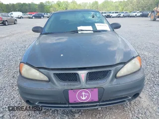 2005 Pontiac Grand Am SE with VIN 1G2NE52E95M131462, listed as a IAAI auction lot 41964139 with 273,443 mi miles. Bid and sale history available at carsss.com. Image 12.
