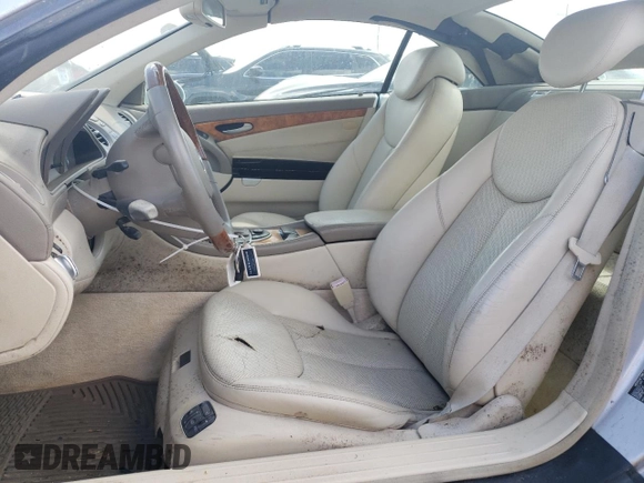 2003 Mercedes-Benz SL 500 z VIN WDBSK75F13F032092, wystawiony jako Copart lot #75596144 z przebiegiem 43 508 mil mil oraz Nie do naprawy • Non repairable. Historia ofert i sprzedaży dostępna na DreamBid. Obrazek 7.