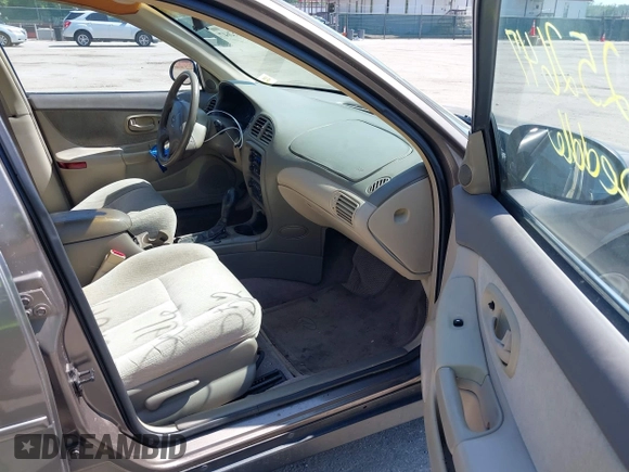 1999 Oldsmobile Intrigue GX z VIN 1G3WH52K5XF334949, wystawiony jako IAAI lot #42252647 z przebiegiem 80 705 mil mil oraz . Historia ofert i sprzedaży dostępna na DreamBid. Obrazek 5.