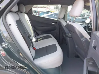 2021 Chevrolet Bolt EV LT z VIN 1G1FY6S03M4112754, wystawiony jako IAAI lot #41615350 z przebiegiem Nie podano mil oraz . Historia ofert i sprzedaży dostępna na DreamBid. Obrazek 8.