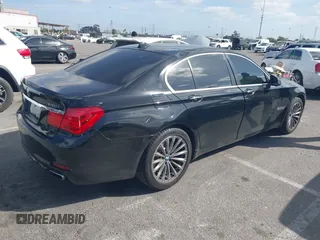 2012 BMW 7 Series 740i with VIN WBAKA4C5XCDS99253, listed as a IAAI auction lot 41710171 with 176,907 mi miles. Bid and sale history available at carsss.com. Image 4.