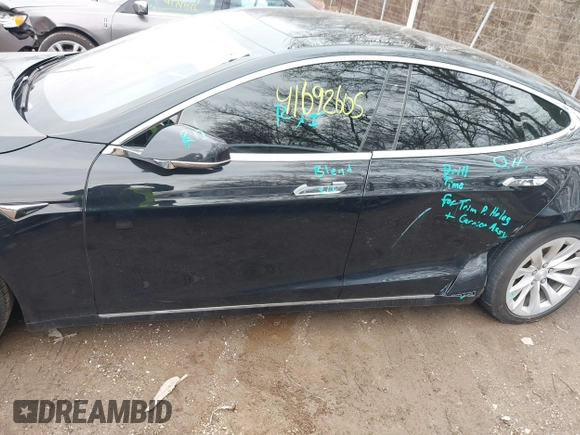 2017 Tesla Model S 100D with VIN 5YJSA1E25HF215778, listed as a IAAI auction lot 41692605 with Not Provided miles and . Bid and sale history available at DreamBid. Image 14.
