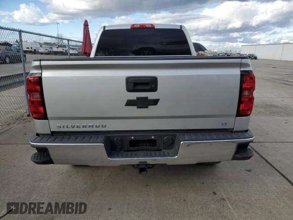 2015 Chevrolet Silverado 1500 LT with VIN 3GCPCREC3FG533011, listed as a Copart auction lot 45026255 with 118,852 mi miles and Salvage Title. Bid and sale history available at DreamBid. Image 6.