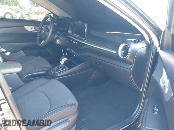 2023 Kia Forte LXS with VIN 3KPF24AD7PE680915, listed as a IAAI auction lot 40741003 with 16,770 mi miles and . Bid and sale history available at DreamBid. Image 5.
