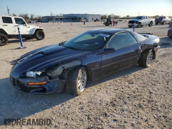 2000 Chevrolet Camaro Z28 z VIN 2G1FP22G3Y2123001, wystawiony jako Copart lot #85730994 z przebiegiem 32 579 mil mil oraz Szkoda całkowita • Salvage title. Historia ofert i sprzedaży dostępna na DreamBid. Obrazek 1.