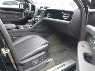2022 Bentley Bentayga V8 z VIN SJAAM2ZV1NC013849, wystawiony jako IAAI lot #42176939 z przebiegiem 15 292 mil mil oraz . Historia ofert i sprzedaży dostępna na DreamBid. Obrazek 5.