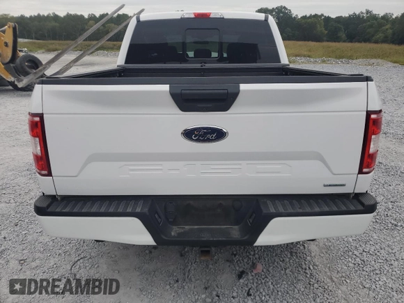 2020 Ford F-150 XL with VIN 1FTEW1CPXLKE54719, listed as a Copart auction lot 71089514 with 53,887 mi miles and Salvage Title. Bid and sale history available at carsss.com. Image 6.