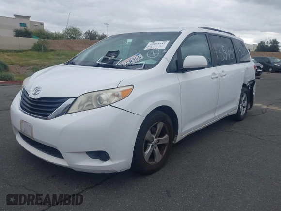 2012 Toyota Sienna LE AAS with VIN 5TDKK3DC4CS183817, listed as a IAAI auction lot 42013545 with 207,822 mi miles. Bid and sale history available at carsss.com. Image 2.