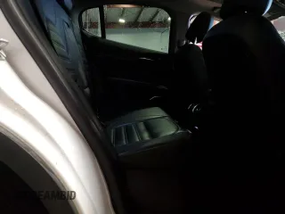 2019 Alfa Romeo Stelvio Ti z VIN ZASPAKBN4K7C49127, wystawiony jako Copart lot #57079975 z przebiegiem 55 557 mil mil oraz Szkoda całkowita • Salvage title. Historia ofert i sprzedaży dostępna na DreamBid. Obrazek 11.
