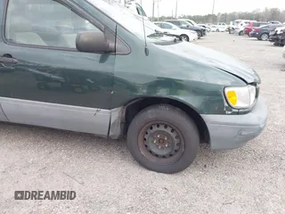 2000 Toyota Sienna CE with VIN 4T3ZF19C7YU240601, listed as a IAAI auction lot 41709617 with 999,999 mi miles. Bid and sale history available at carsss.com. Image 6.