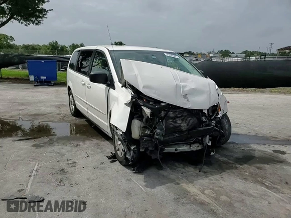 2009 Dodge Grand Caravan SE z VIN 1D8HN44E49B520433, wystawiony jako Copart lot #59439605 z przebiegiem Nie podano mil oraz Szkoda całkowita • Salvage title. Historia ofert i sprzedaży dostępna na DreamBid. Obrazek 14.