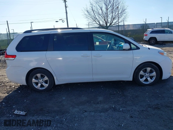 2014 Toyota Sienna LE AAS with VIN 5TDKK3DC6ES489789, listed as a IAAI auction lot 41899933 with 81,090 mi miles and . Bid and sale history available at DreamBid. Image 13.