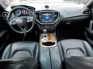 2016 Maserati Ghibli S z VIN ZAM57RSA3G1184409, wystawiony jako Copart lot #59459615 z przebiegiem 81 925 mil mil oraz Czysty tytuł • Clean title. Historia ofert i sprzedaży dostępna na DreamBid. Obrazek 8.