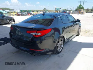 2013 Kia Optima SX z VIN 5XXGR4A69DG141426, wystawiony jako IAAI lot #41946366 z przebiegiem 75 937 mil mil oraz . Historia ofert i sprzedaży dostępna na DreamBid. Obrazek 4.