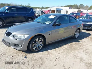 2012 BMW 3 Series 335i xDrive with VIN WBAKF9C5XCE620684, listed as a IAAI auction lot 41341828 with 154,809 mi miles. Bid and sale history available at carsss.com. Image 2.