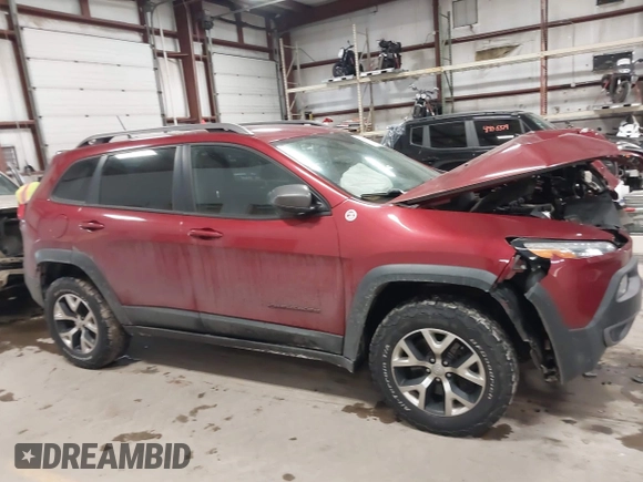2015 Jeep Cherokee Trailhawk with VIN 1C4PJMBS7FW646577, listed as a IAAI auction lot 41404911 with 85,343 mi miles and . Bid and sale history available at DreamBid. Image 13.