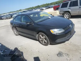 2014 Volkswagen Jetta TDI w/Premium with VIN 3VW3L7AJ2EM392016, listed as a Copart auction lot 69305904 with 111,903 mi miles and Salvage title. Bid and sale history available at DreamBid. Image 4.