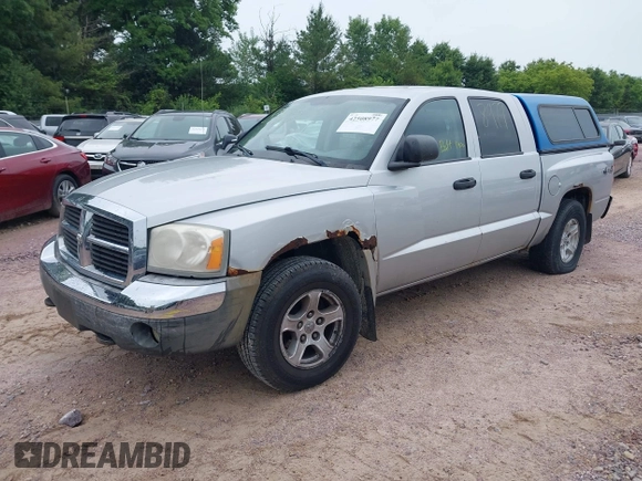 2005 Dodge Dakota SLT with VIN 1D7HW48N65S199887, listed as a IAAI auction lot 42508977 with 192,330 mi miles and . Bid and sale history available at DreamBid. Image 2.