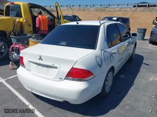 2006 Mitsubishi Lancer ES with VIN JA3AJ26E56U012676, listed as a IAAI auction lot 41857476 with 1 mi miles. Bid and sale history available at carsss.com. Image 4.