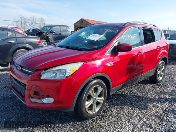 2014 Ford Escape SE with VIN 1FMCU9G90EUD71021, listed as a IAAI auction lot 42052487 with 154,811 mi miles and . Bid and sale history available at DreamBid. Image 2.