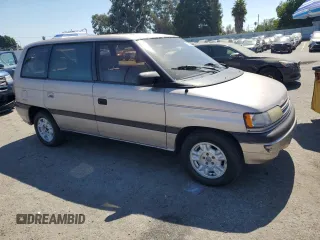 1992 Mazda MPV z VIN JM3LV5222N0453058, wystawiony jako Copart lot #72283634 z przebiegiem 174 084 mil mil oraz Szkody całkowita. Historia ofert i sprzedaży dostępna na DreamBid. Obrazek 4.