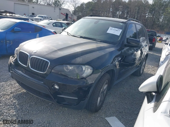 2011 BMW X5 35i with VIN 5UXZV4C58BL406373, listed as a IAAI auction lot 41715817 with 101,900 mi miles. Bid and sale history available at carsss.com. Image 2.