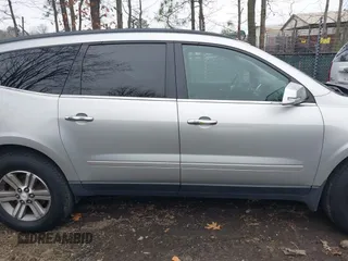 2015 Chevrolet Traverse LT with VIN 1GNKVHKD9FJ122097, listed as a IAAI auction lot 41794833 with 170,314 mi miles and . Bid and sale history available at DreamBid. Image 13.