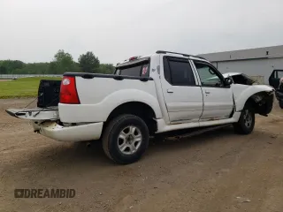 2005 Ford Explorer Sport Trac XLS with VIN 1FMZU77K75UB56611, listed as a Copart auction lot 60622925 with 157,063 mi miles and Salvage title. Bid and sale history available at DreamBid. Image 3.