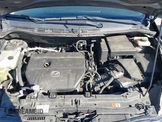2014 Mazda 5 Sport with VIN JM1CW2BL5E0166522, listed as a IAAI auction lot 41635454 with 94,225 mi miles and . Bid and sale history available at DreamBid. Image 10.