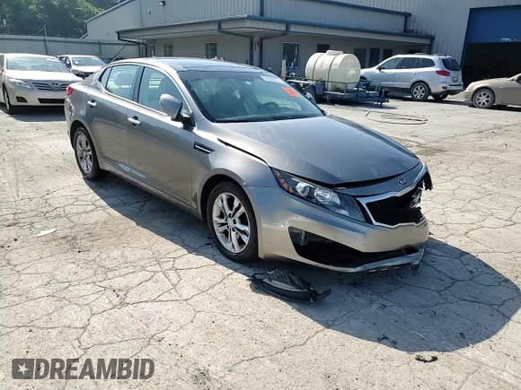 2013 Kia Optima EX z VIN 5XXGN4A73DG228548, wystawiony jako Copart lot #62209395 z przebiegiem 142 692 mil mil oraz Szkoda całkowita • Salvage title. Historia ofert i sprzedaży dostępna na DreamBid. Obrazek 13.
