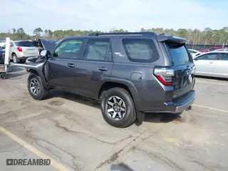 2021 Toyota 4Runner TRD Off Road with VIN JTEPU5JR0M5877962, listed as a IAAI auction lot 41683297 with 61,539 mi miles. Bid and sale history available at carsss.com. Image 3.