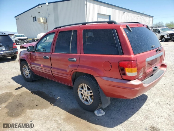 2004 Jeep Grand Cherokee Laredo with VIN 1J4GW48N84C311923, listed as a Copart auction lot 52144535 with 231,069 mi miles and Salvage Title. Bid and sale history available at carsss.com. Image 2.