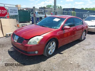 2004 Nissan Maxima SL with VIN 1N4BA41E04C838112, listed as a IAAI auction lot 42164374 with 185,306 mi miles and . Bid and sale history available at DreamBid. Image 2.