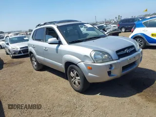 2007 Hyundai Tucson SE with VIN KM8JN12D07U632975, listed as a IAAI auction lot 42099734 with 154,320 mi miles. Bid and sale history available at carsss.com. Image 1.
