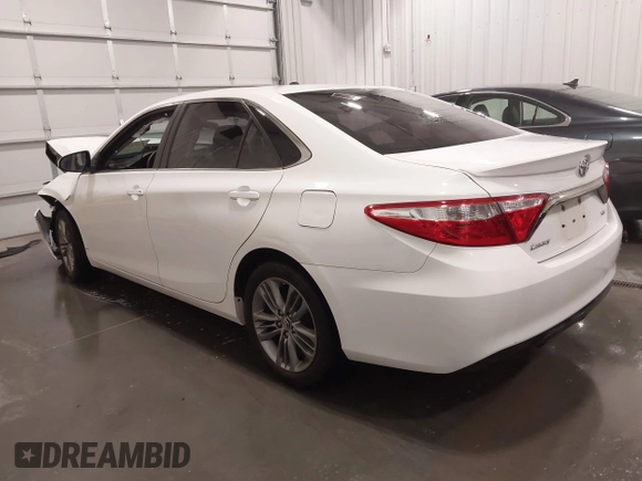 2015 Toyota Camry XLE with VIN 4T1BF1FK0FU056717, listed as a IAAI auction lot 41966126 with 159,246 mi miles and . Bid and sale history available at DreamBid. Image 3.