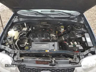2002 Ford Escape XLT Choice with VIN 1FMYU04182KD34094, listed as a Copart auction lot 57299225 with 154,784 mi miles and Salvage title. Bid and sale history available at DreamBid. Image 12.