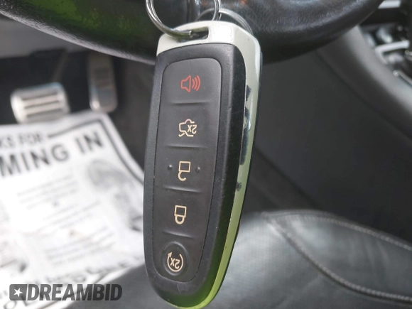 2015 Ford Taurus SHO with VIN 1FAHP2KT7FG148444, listed as a IAAI auction lot 40788614 with 121,533 mi miles and . Bid and sale history available at DreamBid. Image 11.